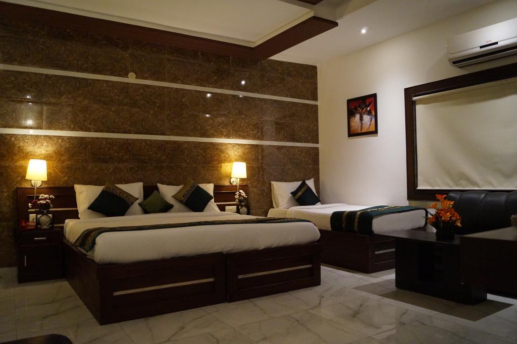 ออปติมัม ทาราพาเลซ แอท ทัช Hotel อัครา ห้อง รูปภาพ